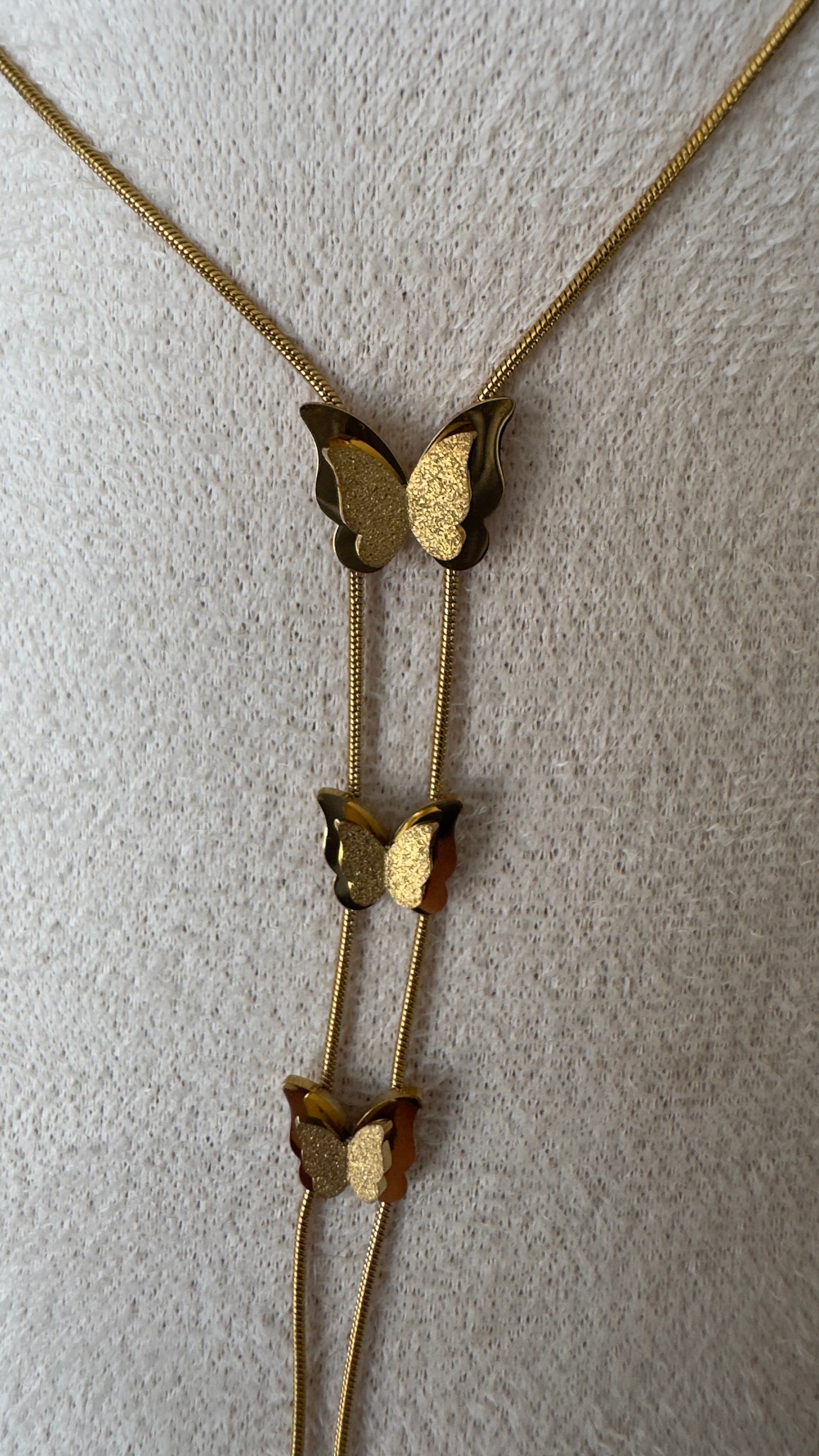 Conjunto Borboleta em Aço Dourado